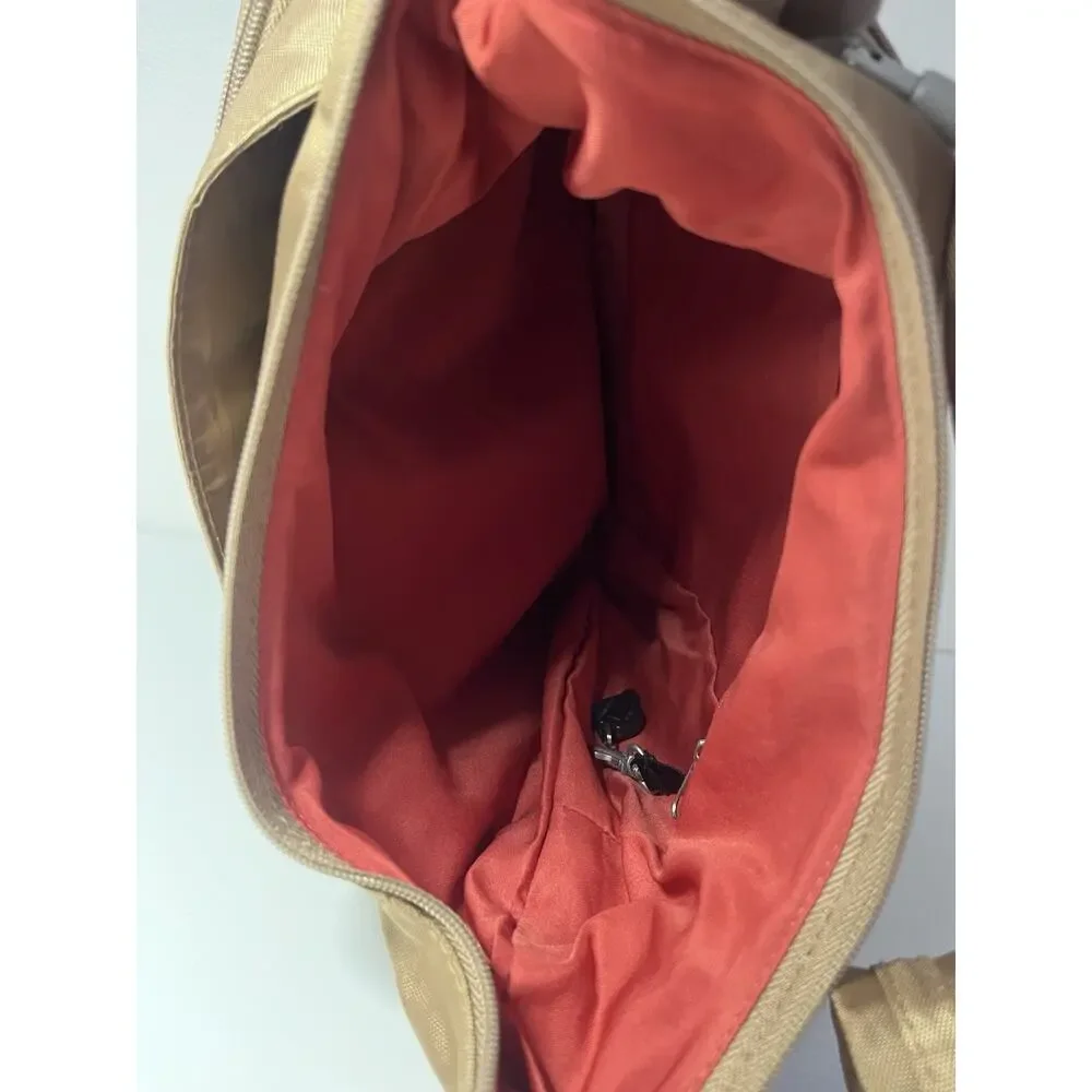 TRAVELON Anti-Theft Classic Crossbody Bucket Bag Tan Slash Proof RFID Locking
